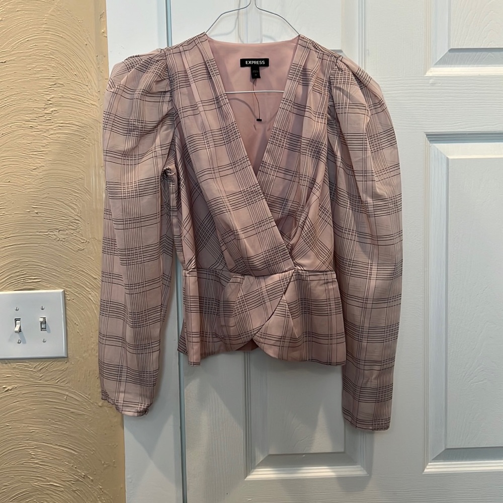Pink peplum plaid top